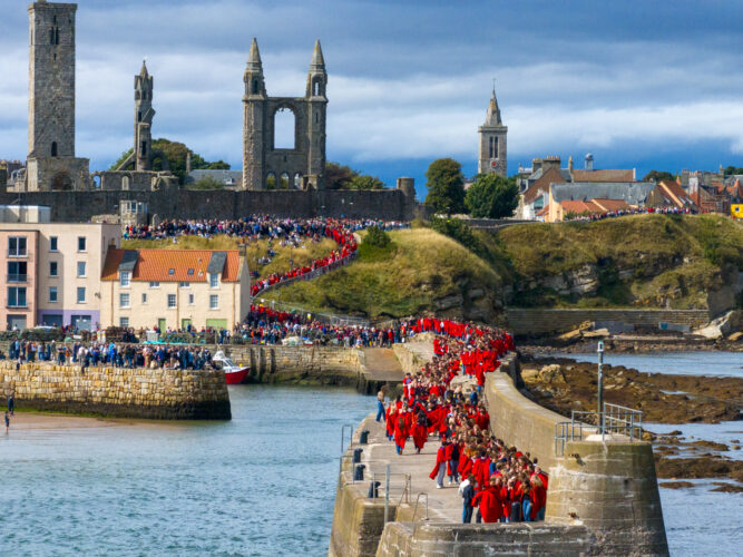 Hundreds of students take part in traditional St Andrews Pier Walk