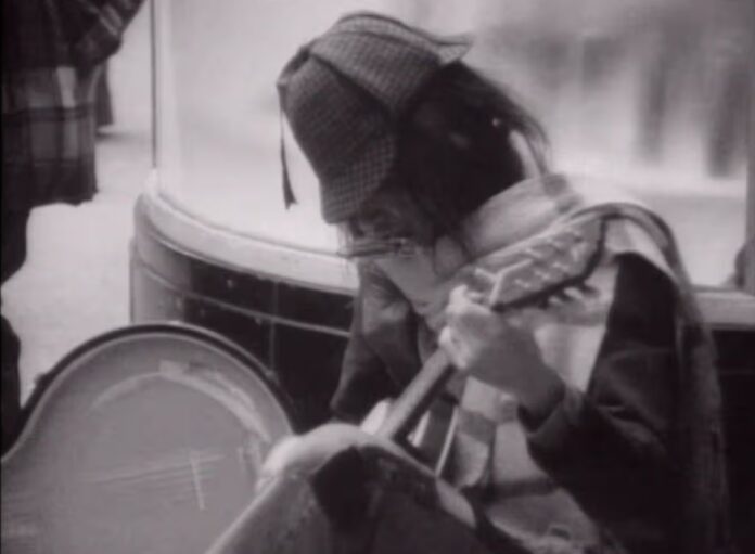 Remembering the time Neil Young took to the streets of Glasgow to busk